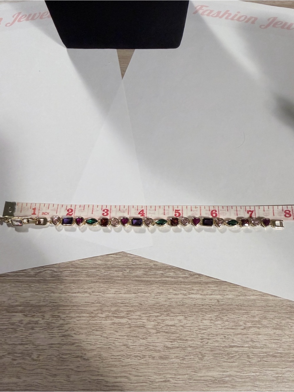 Gold-Tone Bracelet with Pink Heart Charm and Clear Stones